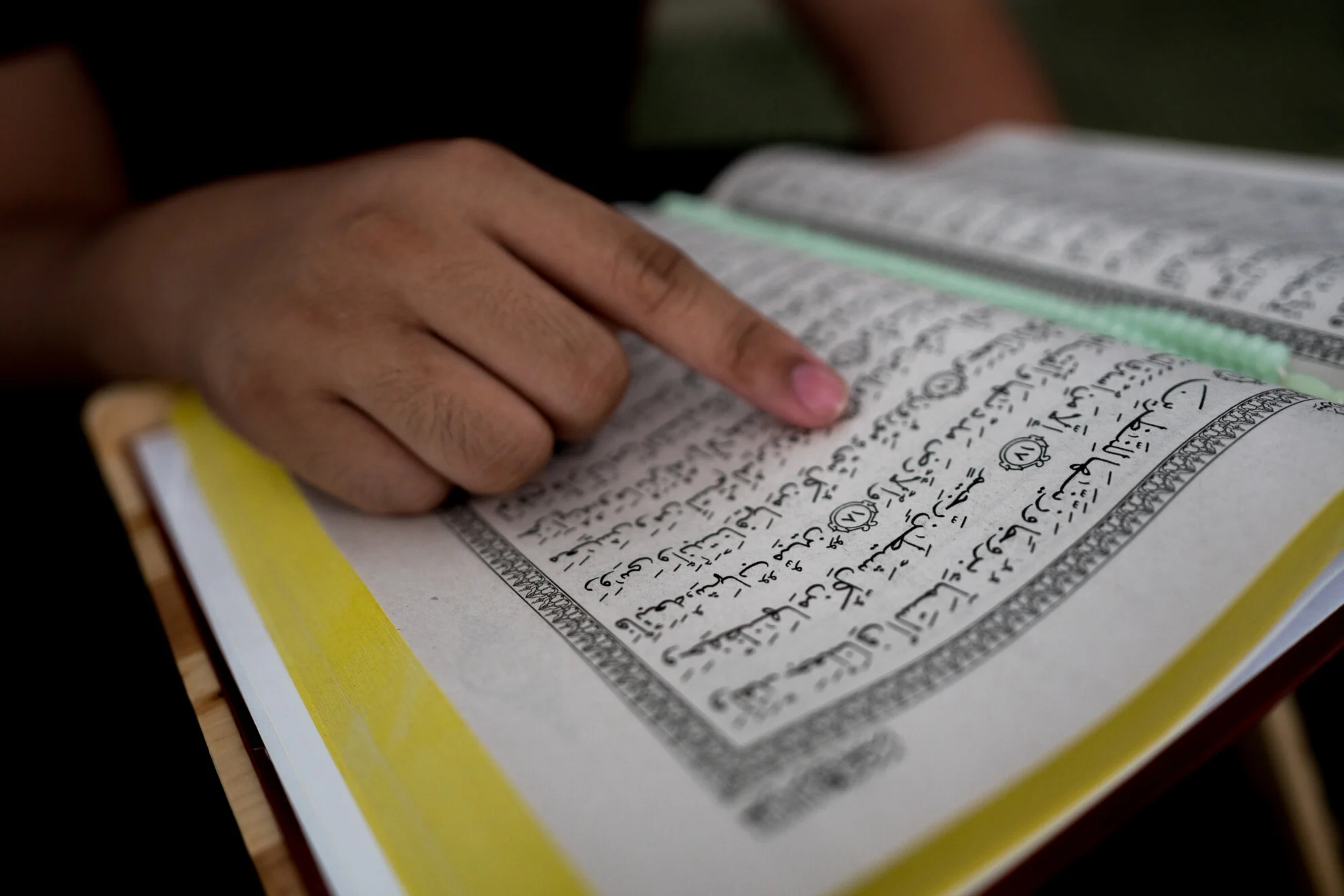 Close Up Person Reading Koran