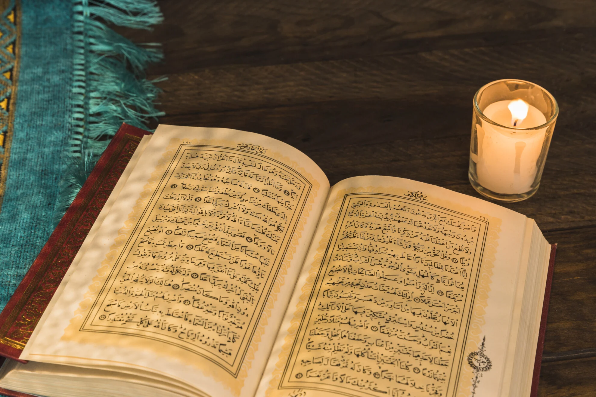 Old Quran Lying Near Candle